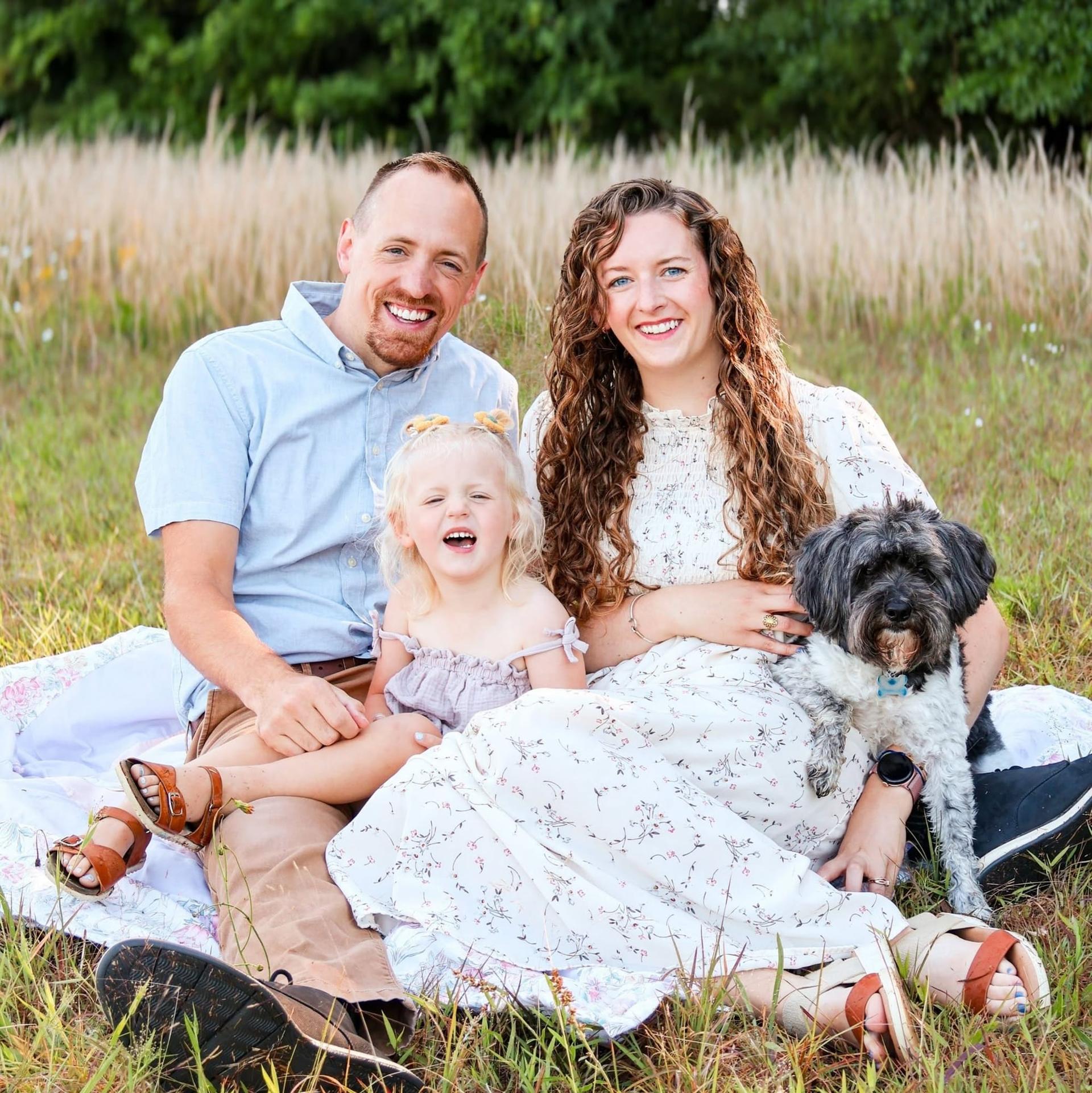 Our family, including our toddler Ruby and our dog Waylon
